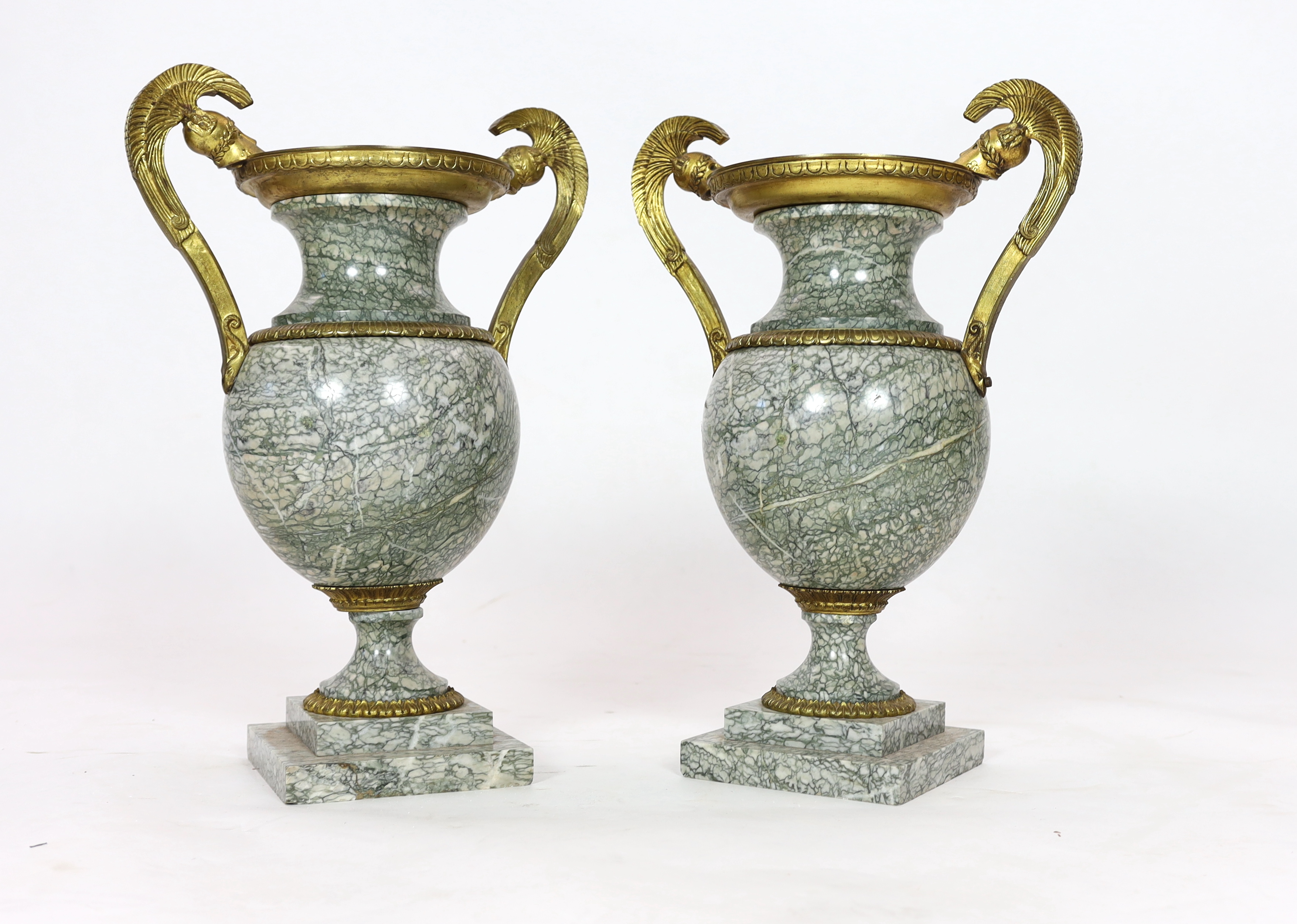 A pair of 19th century ormolu mounted Chipollino green variegated marble vases, 43cm wide, 60cm high, Please note this lot attracts an additional import tax of 5% on the hammer price